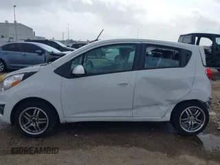 2014 Chevrolet Spark LT with VIN KL8CD6S94EC426322, listed as a IAAI auction lot 41894970 with 65,818 mi miles. Bid and sale history available at carsss.com. Image 15.