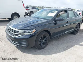 2023 Volkswagen Jetta SE with VIN 3VW7M7BU9PM017606, listed as a IAAI auction lot 41729590 with 8,496 mi miles. Bid and sale history available at carsss.com. Image 16.