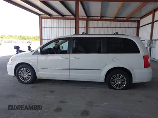 2014 Chrysler Town & Country Touring-L with VIN 2C4RC1CG2ER312444, listed as a IAAI auction lot 42050774 with 124,010 mi miles. Bid and sale history available at carsss.com. Image 14.
