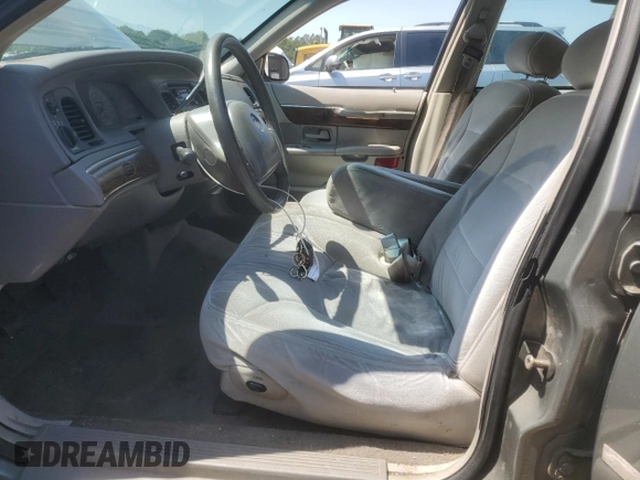 1999 Mercury Grand Marquis LS z VIN 2MEFM75W9XX687526, wystawiony jako Copart lot #51779995 z przebiegiem 196 466 mil mil oraz Szkoda całkowita • Salvage title. Historia ofert i sprzedaży dostępna na DreamBid. Obrazek 7.