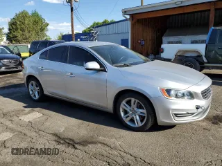 2014 Volvo S60 T5 z VIN YV1612FS0E1292871, wystawiony jako Copart lot #60105755 z przebiegiem 122 279 mil mil oraz Czysty tytuł • Clean title. Historia ofert i sprzedaży dostępna na DreamBid. Obrazek 4.