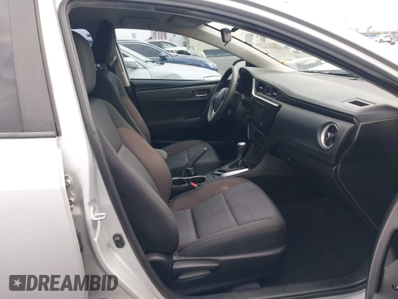 2019 Toyota Corolla L with VIN 5YFBURHE4KP929909, listed as a IAAI auction lot 42078797 with 131,741 mi miles. Bid and sale history available at carsss.com. Image 5.