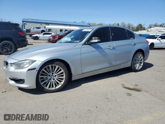 2014 BMW 3 Series 335i xDrive with VIN WBA3B9G57ENR91797, listed as a Copart auction lot 53724325 with 164,279 mi miles and Salvage Title. Bid and sale history available at DreamBid. Image 1.