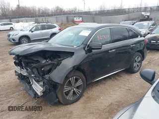 2017 Acura MDX with VIN 5FRYD4H39HB020837, listed as a IAAI auction lot 41217037 with 102,897 mi miles. Bid and sale history available at carsss.com. Image 17.