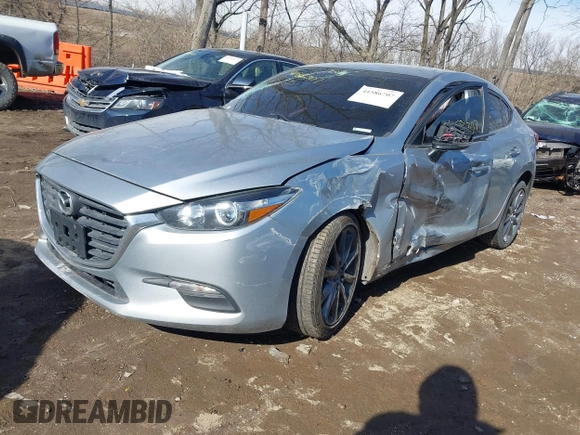 2018 Mazda 3 Touring z VIN 3MZBN1V36JM205904, wystawiony jako IAAI lot #41586707 z przebiegiem 145 401 mil mil oraz . Historia ofert i sprzedaży dostępna na DreamBid. Obrazek 16.