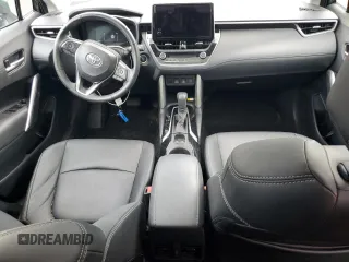2023 Toyota Corolla Cross XLE с VIN 7MUDAAAG4PV038098, выставлен на аукционе Copart как лот 57906915 с пробегом 73 569 миль миль и Списание • Salvage title. История ставок и продаж доступна на DreamBid. Изображение 8.