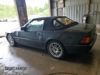 1992 Mercedes-Benz 500 z VIN WDBFA66E2NF038636, wystawiony jako Copart lot #55522605 z przebiegiem 92 002 mil mil oraz Szkody całkowita. Historia ofert i sprzedaży dostępna na DreamBid. Obrazek 2.