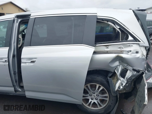 2012 Honda Odyssey EX with VIN 5FNRL5H46CB016065, listed as a IAAI auction lot 41849195 with 125,400 mi miles and . Bid and sale history available at DreamBid. Image 19.