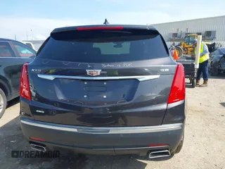 2018 Cadillac XT5 Luxury AWD z VIN 1GYKNDRS0JZ209266, wystawiony jako IAAI lot #42454536 z przebiegiem 52 839 mil mil oraz . Historia ofert i sprzedaży dostępna na DreamBid. Obrazek 16.