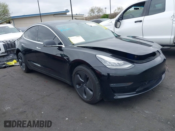 2020 Tesla Model 3 Long Range z VIN 5YJ3E1EB8LF790197, wystawiony jako IAAI lot #42053433 z przebiegiem 73 006 mil mil oraz . Historia ofert i sprzedaży dostępna na DreamBid. Obrazek 1.