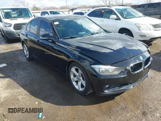 2015 BMW 3 Series 328i xDrive with VIN WBA3B5G56FNS20581, listed as a IAAI auction lot 41692014 with 196,609 mi miles. Bid and sale history available at carsss.com. Image 1.