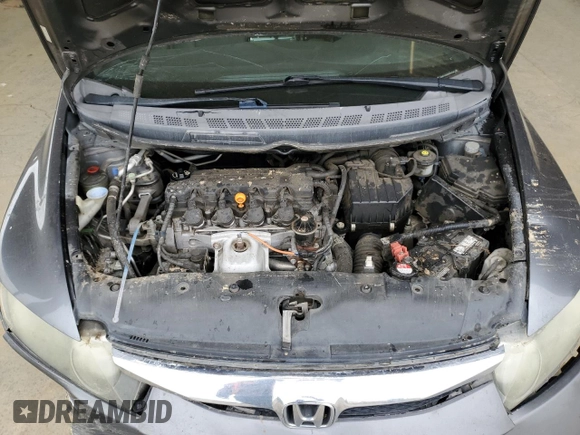 2010 Honda Civic z VIN 19XFA1E39AE037346, wystawiony jako Copart lot #53279185 z przebiegiem 148 350 mil mil oraz Szkoda całkowita • Salvage title. Historia ofert i sprzedaży dostępna na DreamBid. Obrazek 13.