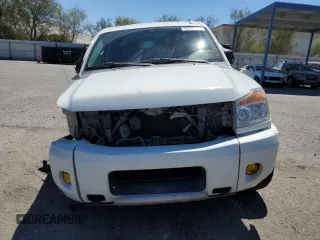 2015 Nissan Titan Pro-4X z VIN 1N6AA0EC9FN512658, wystawiony jako Copart lot #68066964 z przebiegiem 131 026 mil mil oraz Szkoda całkowita • Salvage title. Historia ofert i sprzedaży dostępna na DreamBid. Obrazek 5.