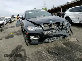 2013 BMW X6 xDrive50i z VIN 5UXFG8C57DL591149, wystawiony jako Copart lot #56979865 z przebiegiem 94 251 mil mil oraz Szkoda całkowita • Salvage title. Historia ofert i sprzedaży dostępna na DreamBid. Obrazek 11.