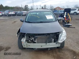 2019 Nissan Versa SV with VIN 3N1CN7AP7KL863891, listed as a IAAI auction lot 41863544 with 90,000 mi miles and . Bid and sale history available at DreamBid. Image 13.