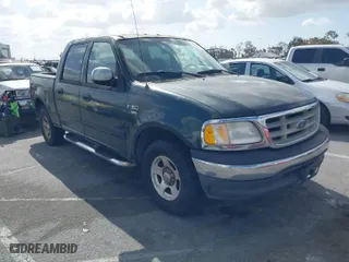 2001 Ford F-150 SuperCrew XLT with VIN 1FTRW07WX1KA43606, listed as a IAAI auction lot 41956736 with NaN miles. Bid and sale history available at carsss.com. Image 1.
