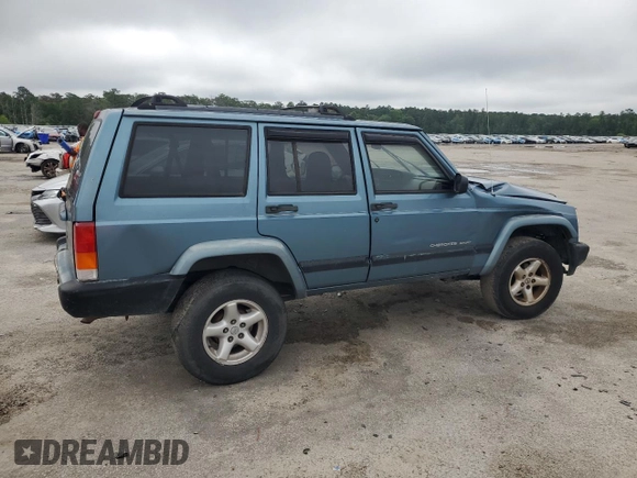 1999 Jeep Cherokee Sport с VIN 1J4FT68S9XL552299, выставлен на аукционе Copart как лот 58045135 с пробегом Не указан миль и Списание • Salvage title. История ставок и продаж доступна на DreamBid. Изображение 3.