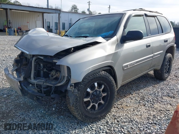 2003 GMC Envoy SLT with VIN 1GKDS13SX32203909, listed as a IAAI auction lot 41457713 with 199,507 mi miles. Bid and sale history available at carsss.com. Image 15.