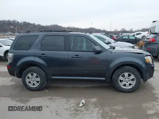 2010 Mercury Mariner z VIN 4M2CN8B75AKJ21050, wystawiony jako IAAI lot #41684770 z przebiegiem 149 028 mil mil oraz . Historia ofert i sprzedaży dostępna na DreamBid. Obrazek 13.