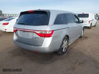 2012 Honda Odyssey Touring with VIN 5FNRL5H96CB095264, listed as a IAAI auction lot 41403450 with 246,199 mi miles. Bid and sale history available at carsss.com. Image 4.