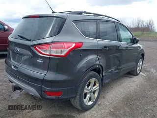 2016 Ford Escape SE with VIN 1FMCU9G92GUC22029, listed as a IAAI auction lot 42032478 with 133,853 mi miles. Bid and sale history available at carsss.com. Image 4.