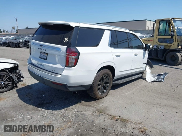 2021 Chevrolet Tahoe LT with VIN 1GNSCNKD7MR103115, listed as a IAAI auction lot 42519654 with 47,834 mi miles and . Bid and sale history available at DreamBid. Image 4.