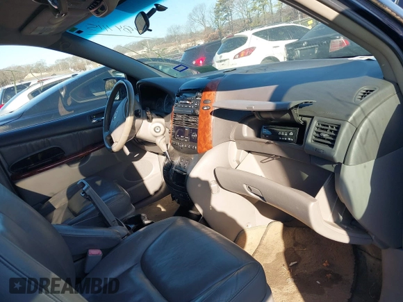 2005 Toyota Sienna XLE with VIN 5TDZA22C55S351384, listed as a IAAI auction lot 41841115 with 999,999 mi miles. Bid and sale history available at carsss.com. Image 5.
