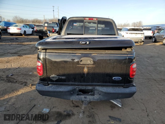 2001 Ford F-150 SuperCrew XLT with VIN 1FTRW07L71KA04123, listed as a Copart auction lot 48477755 with 128,808 mi miles and Clean Title. Bid and sale history available at carsss.com. Image 6.
