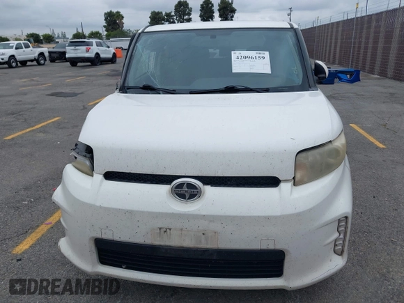 2014 Scion xB with VIN JTLZE4FEXEJ054060, listed as a IAAI auction lot 42096159 with 211,994 mi miles. Bid and sale history available at carsss.com. Image 12.