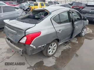 2014 Nissan Versa SV with VIN 3N1CN7AP0EL856205, listed as a IAAI auction lot 41893652 with 126,489 mi miles. Bid and sale history available at carsss.com. Image 4.