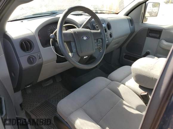 2005 Ford F-150 XL with VIN 1FTRF12W85NB33192, listed as a Copart auction lot 57240225 with 104,331 mi miles and Salvage title. Bid and sale history available at DreamBid. Image 8.