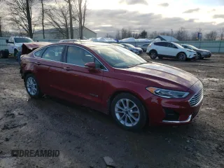 2019 Ford Fusion Hybrid SEL with VIN 3FA6P0MU2KR136805, listed as a Copart auction lot 70913522 with 60,539 mi miles. Bid and sale history available at carsss.com. Image 4.