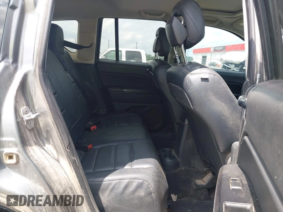 2011 Jeep Compass Latitude with VIN 1J4NT1FB4BD246549, listed as a IAAI auction lot 42156761 with 232,739 mi miles. Bid and sale history available at carsss.com. Image 8.