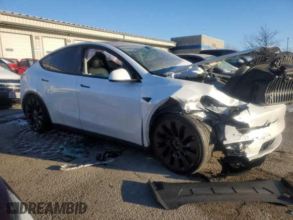 2022 Tesla Model Y Performance with VIN 7SAYGDEFXNF381791, listed as a Copart auction lot 88215705 with 60,153 mi miles and Salvage title. Bid and sale history available at DreamBid. Image 4.