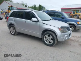 2009 Suzuki Grand Vitara z VIN JS3TD047094100311, wystawiony jako IAAI lot #42338857 z przebiegiem 173 126 mil mil oraz . Historia ofert i sprzedaży dostępna na DreamBid. Obrazek 1.