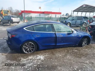 2018 Tesla Model 3 Long Range Battery with VIN 5YJ3E1EB8JF115138, listed as a IAAI auction lot 41343399 with 62,351 mi miles and . Bid and sale history available at DreamBid. Image 14.