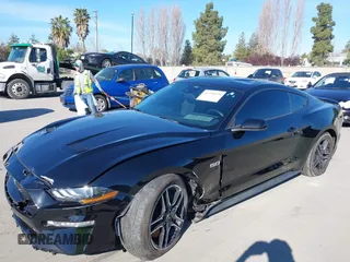 2021 Ford Mustang GT z VIN 1FA6P8CF6M5149175, wystawiony jako IAAI lot #41798328 z przebiegiem 61 776 mil mil oraz . Historia ofert i sprzedaży dostępna na DreamBid. Obrazek 6.