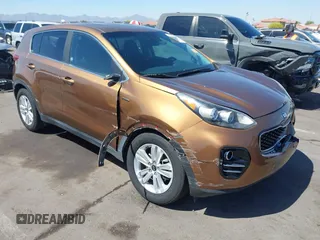 2017 Kia Sportage LX z VIN KNDPMCAC5H7121297, wystawiony jako IAAI lot #42088915 z przebiegiem 91 374 mil mil oraz . Historia ofert i sprzedaży dostępna na DreamBid. Obrazek 1.