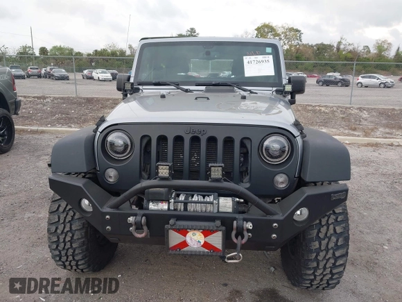 2014 Jeep Wrangler Sport with VIN 1C4AJWAG0EL265409, listed as a IAAI auction lot 41726935 with 78,547 mi miles and . Bid and sale history available at DreamBid. Image 13.