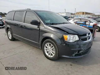 2019 Dodge Grand Caravan SXT with VIN 2C4RDGCG9KR662312, listed as a Copart auction lot 48182105 with 191,199 mi miles and Salvage Title. Bid and sale history available at DreamBid. Image 4.