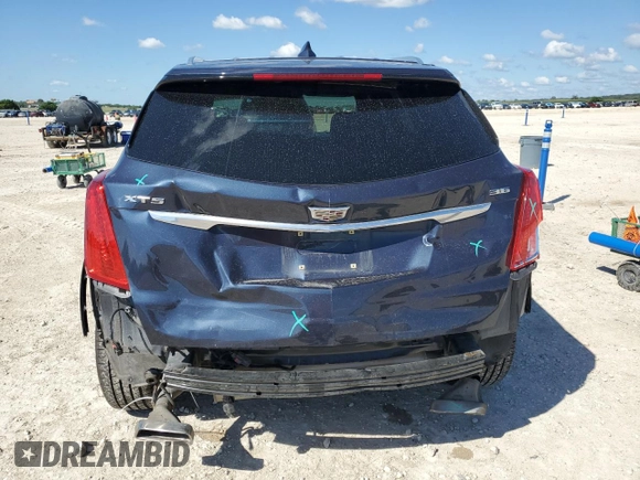 2018 Cadillac XT5 Premium Luxury FWD z VIN 1GYKNERS3JZ133029, wystawiony jako Copart lot #55932695 z przebiegiem 93 098 mil mil oraz Szkoda całkowita • Salvage title. Historia ofert i sprzedaży dostępna na DreamBid. Obrazek 6.