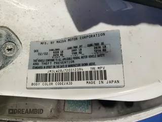 2002 Mazda MPV LX with VIN JM3LW28J720312394, listed as a Copart auction lot 76765674 with 134,286 mi miles and Salvage Title. Bid and sale history available at carsss.com. Image 14.