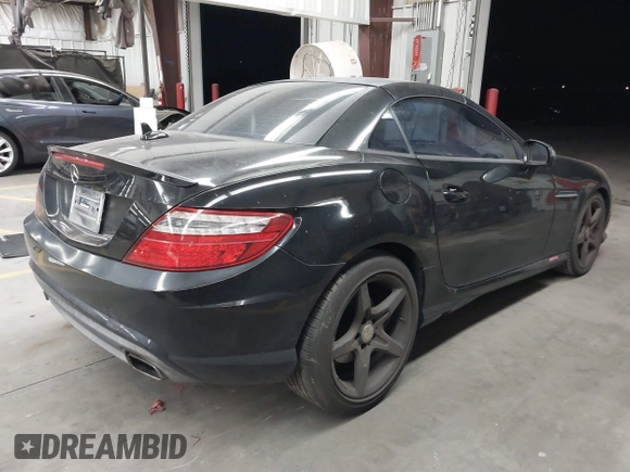 2012 Mercedes-Benz SLK 250 with VIN WDDPK4HA7CF040936, listed as a IAAI auction lot 42637791 with 83,426 mi miles and . Bid and sale history available at DreamBid. Image 4.