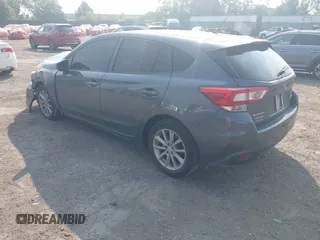 2018 Subaru Impreza with VIN 4S3GTAA63J3748319, listed as a IAAI auction lot 42441310 with 71,616 mi miles and . Bid and sale history available at DreamBid. Image 3.