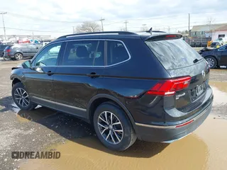 2020 Volkswagen Tiguan SE with VIN 3VV2B7AX5LM091857, listed as a IAAI auction lot 41922727 with 83,464 mi miles and . Bid and sale history available at DreamBid. Image 3.