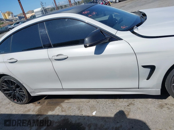 2015 BMW 4 Series 428i xDrive with VIN WBA4C9C54FD330582, listed as a IAAI auction lot 42135691 with 127,289 mi miles and . Bid and sale history available at DreamBid. Image 12.