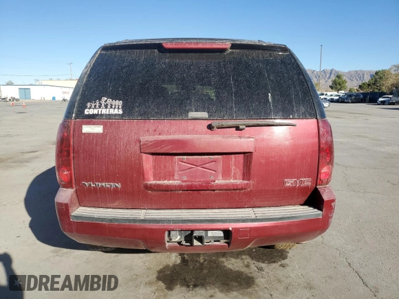 2007 GMC Yukon SLT with VIN 1GKFK13037J101824, listed as a Copart auction lot 77865294 with 179,884 mi miles and Salvage Title. Bid and sale history available at DreamBid. Image 6.