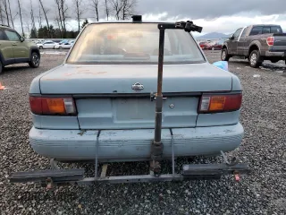 1992 Nissan Sentra E с VIN 1N4EB32A7NC702402, выставлен на аукционе Copart как лот 86629524 с пробегом 233 476 миль миль и Списание • Salvage title. История ставок и продаж доступна на DreamBid. Изображение 6.
