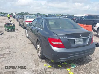 2014 Mercedes-Benz C 250 Sport with VIN WDDGF4HB0EA936265, listed as a IAAI auction lot 42090412 with 113,695 mi miles and . Bid and sale history available at DreamBid. Image 3.