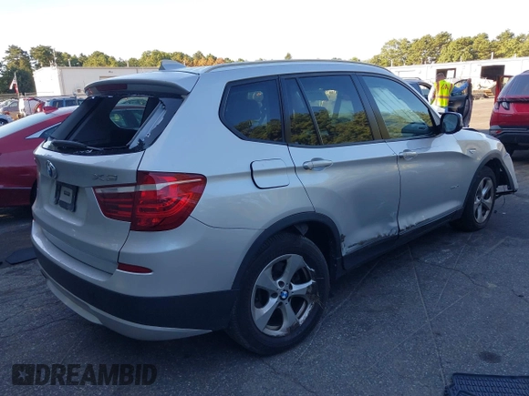 2011 BMW X3 28i with VIN 5UXWX5C5XBL706239, listed as a IAAI auction lot 40258614 with 143,079 mi miles. Bid and sale history available at carsss.com. Image 4.